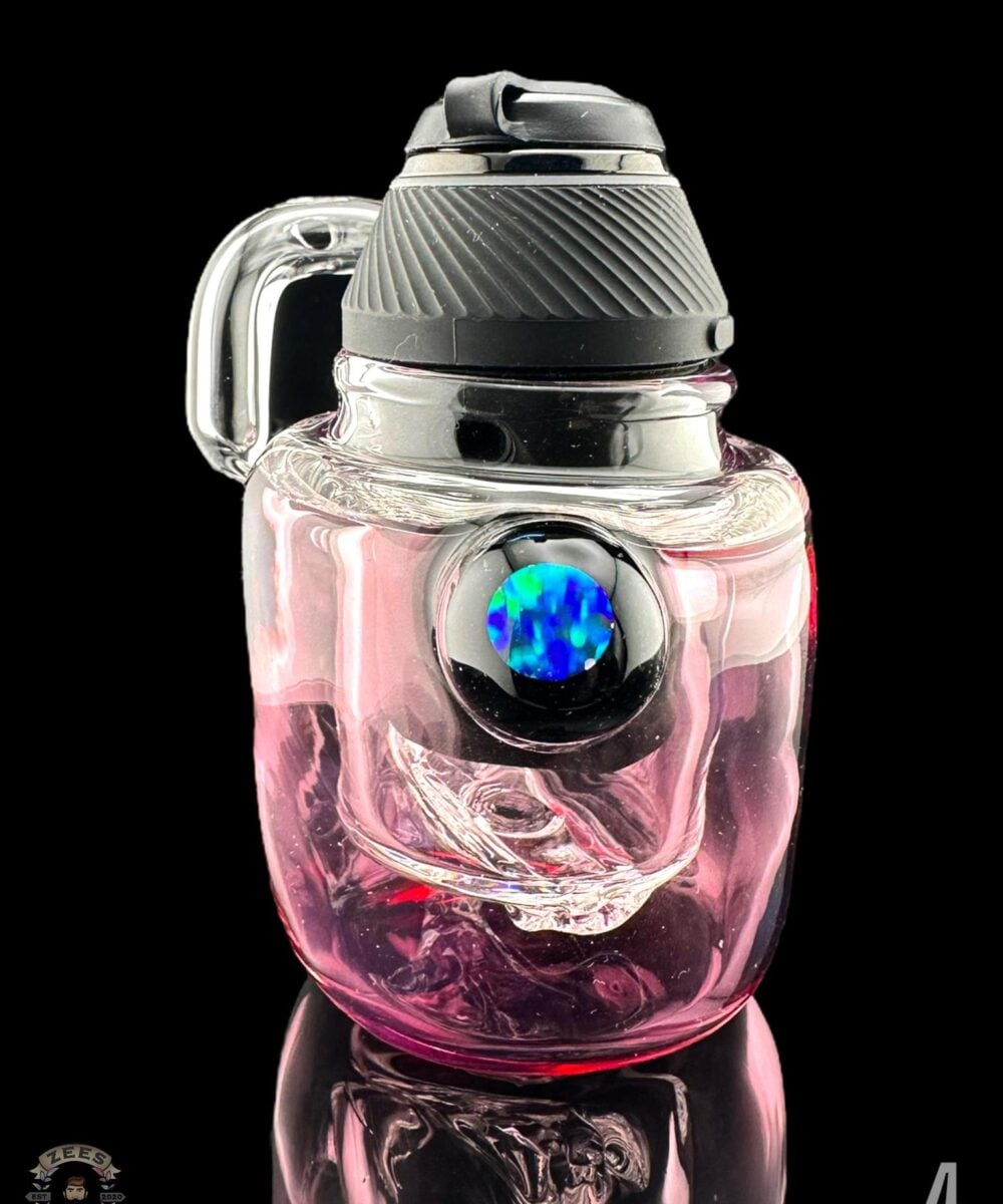 Alternative view of COOPERS GLASS: ENCASED OPAL COIN PUFFER PUFFCO PROXY ATTACHMENT